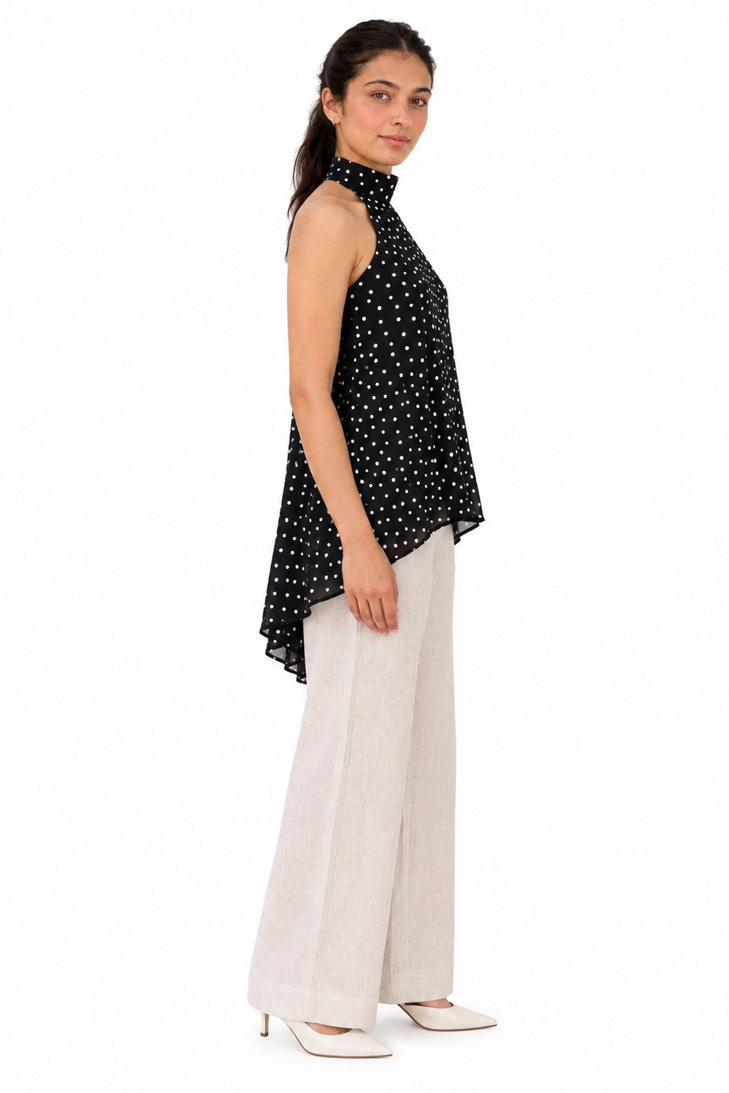 Flowing A-line silhouette with an asymmetrical curved hem for graceful movement and effortless style.