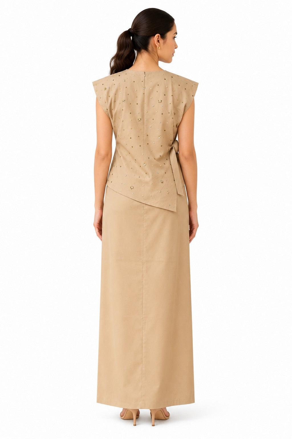 Clean, understated back with a refined straight silhouette, subtle embellishments, and a polished ankle-length finish.