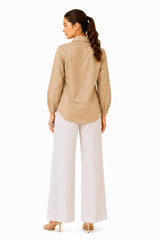 Elegant tailored shirt featuring delicate tonal embellishments along the button placket and collar.