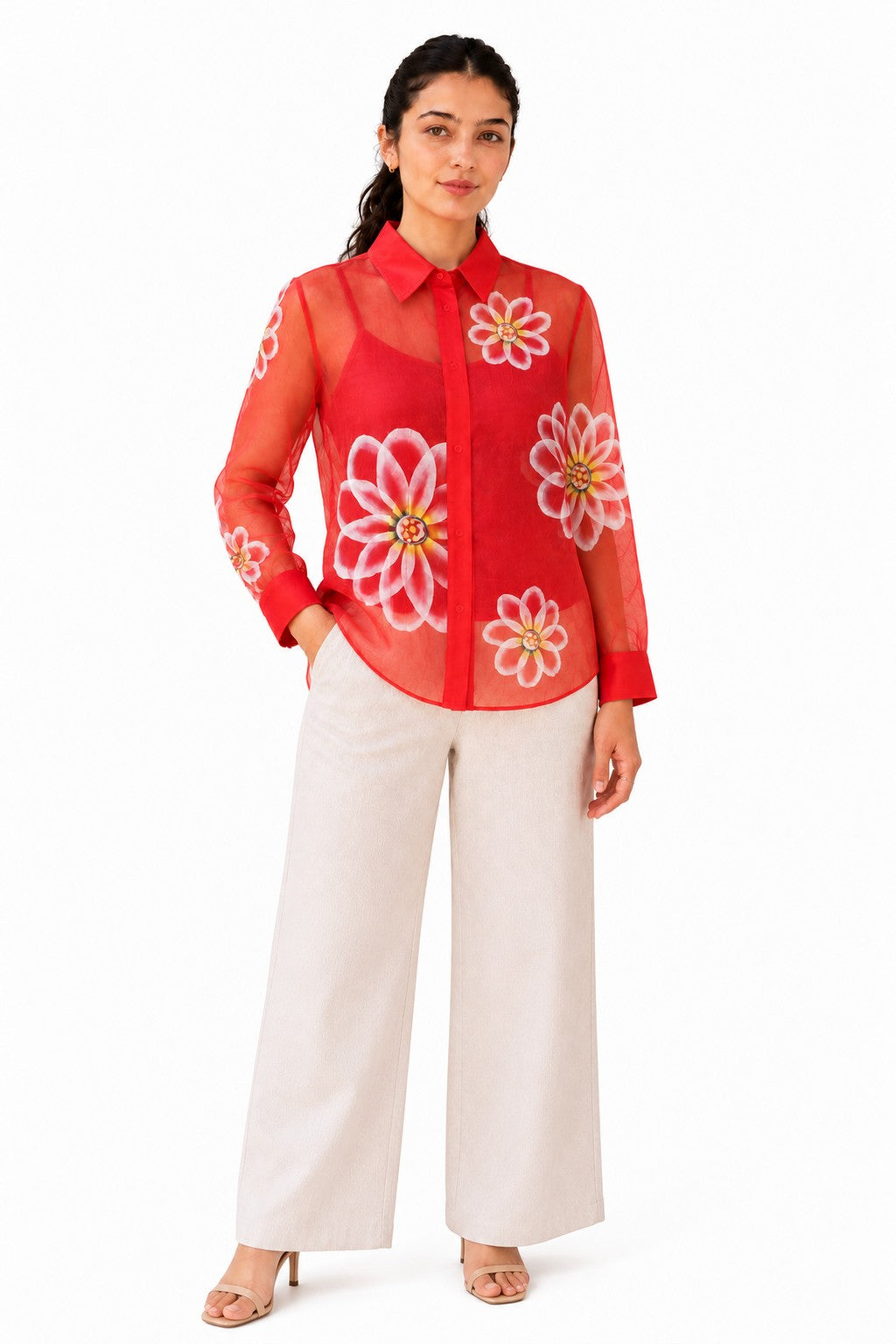 Vibrant red sheer shirt adorned with oversized floral prints, a classic collar, button-down front, and curved hem.