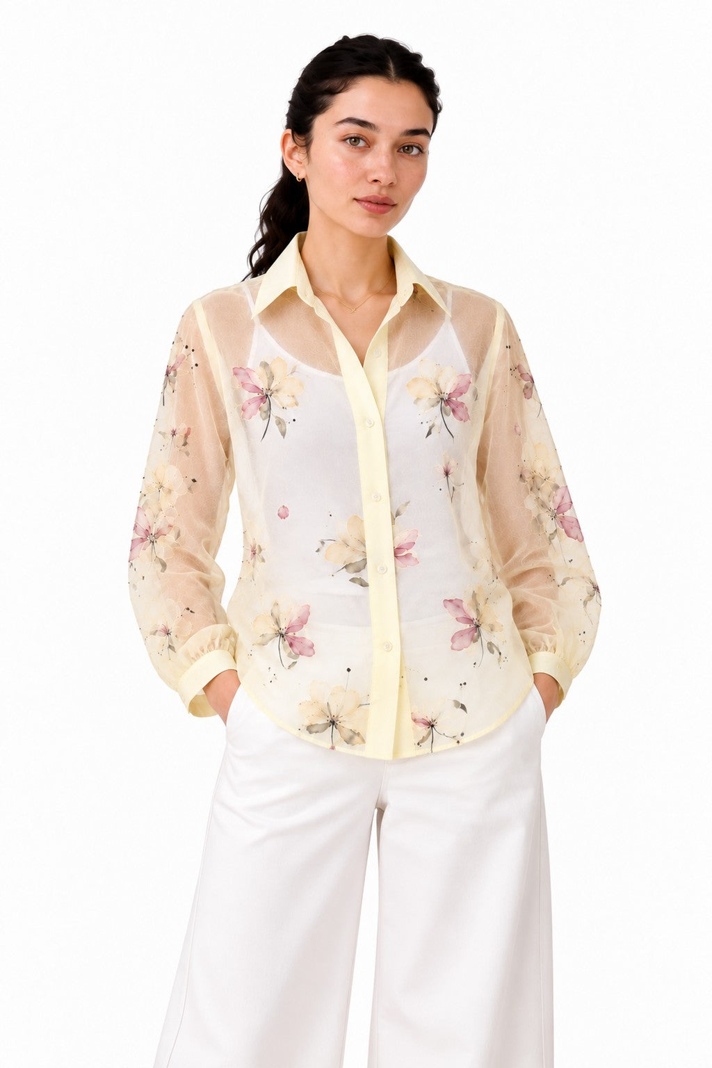 Elegant sheer ivory shirt with a delicate pastel floral print, contrasting cream collar and cuffs, and a classic button-down silhouette.