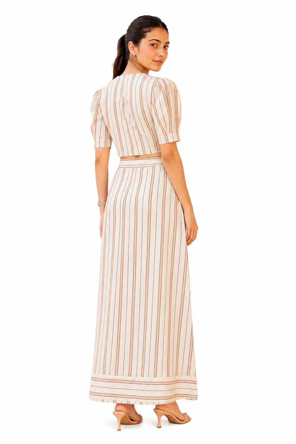 Dune Coord in a soft neutral hue with a flowing maxi skirt