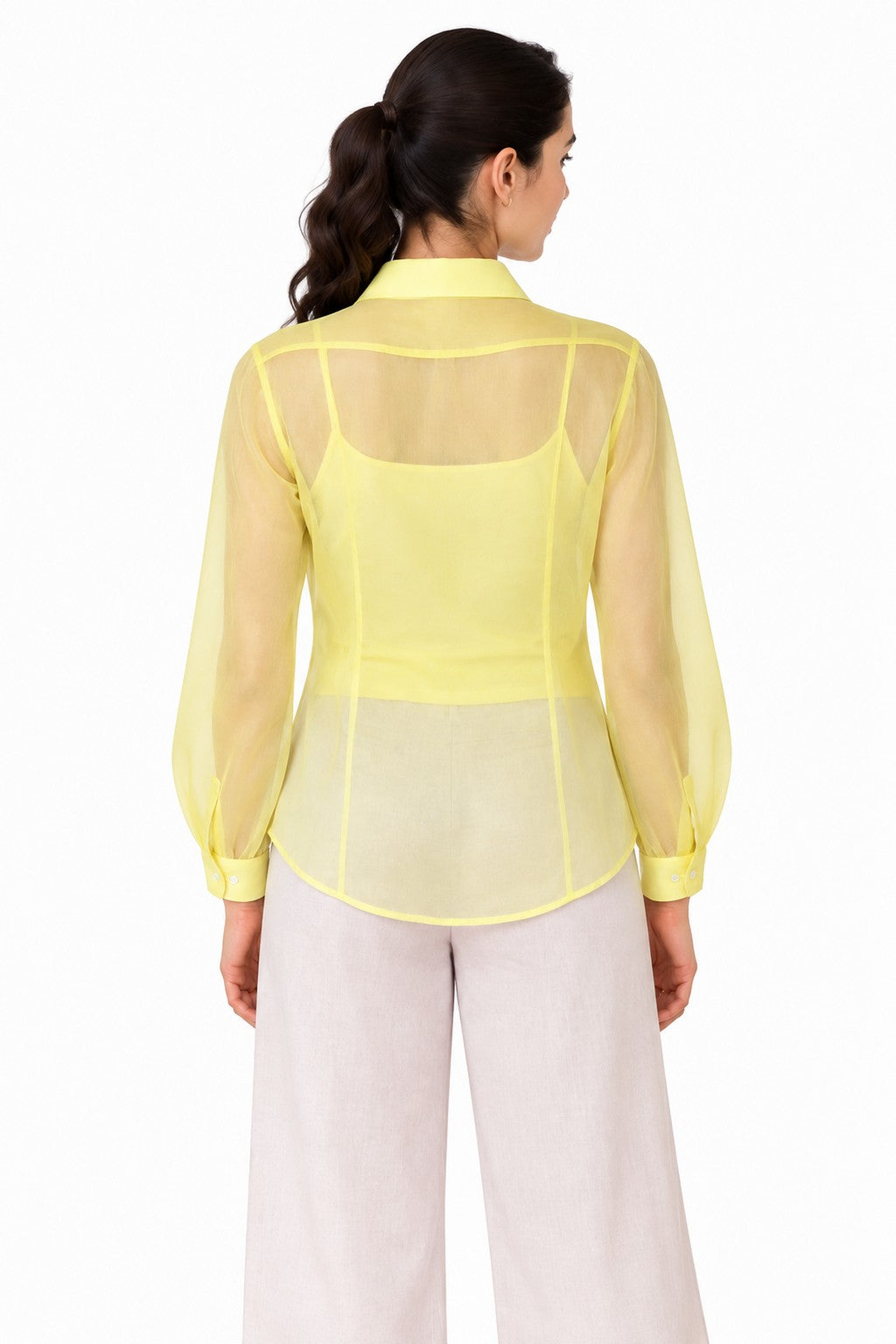 Clean sheer yellow finish with a relaxed curved hem and subtle translucent detailing for an effortless look