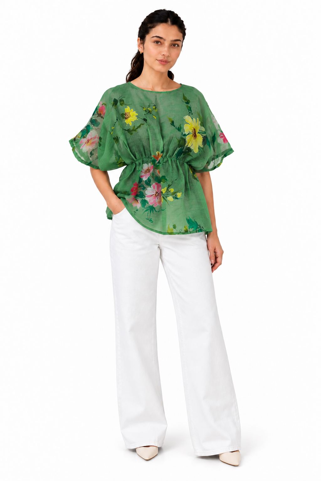 Fresh green floral top featuring a sheer finish, vibrant botanical print, and a softly gathered waist for a flattering silhouette.