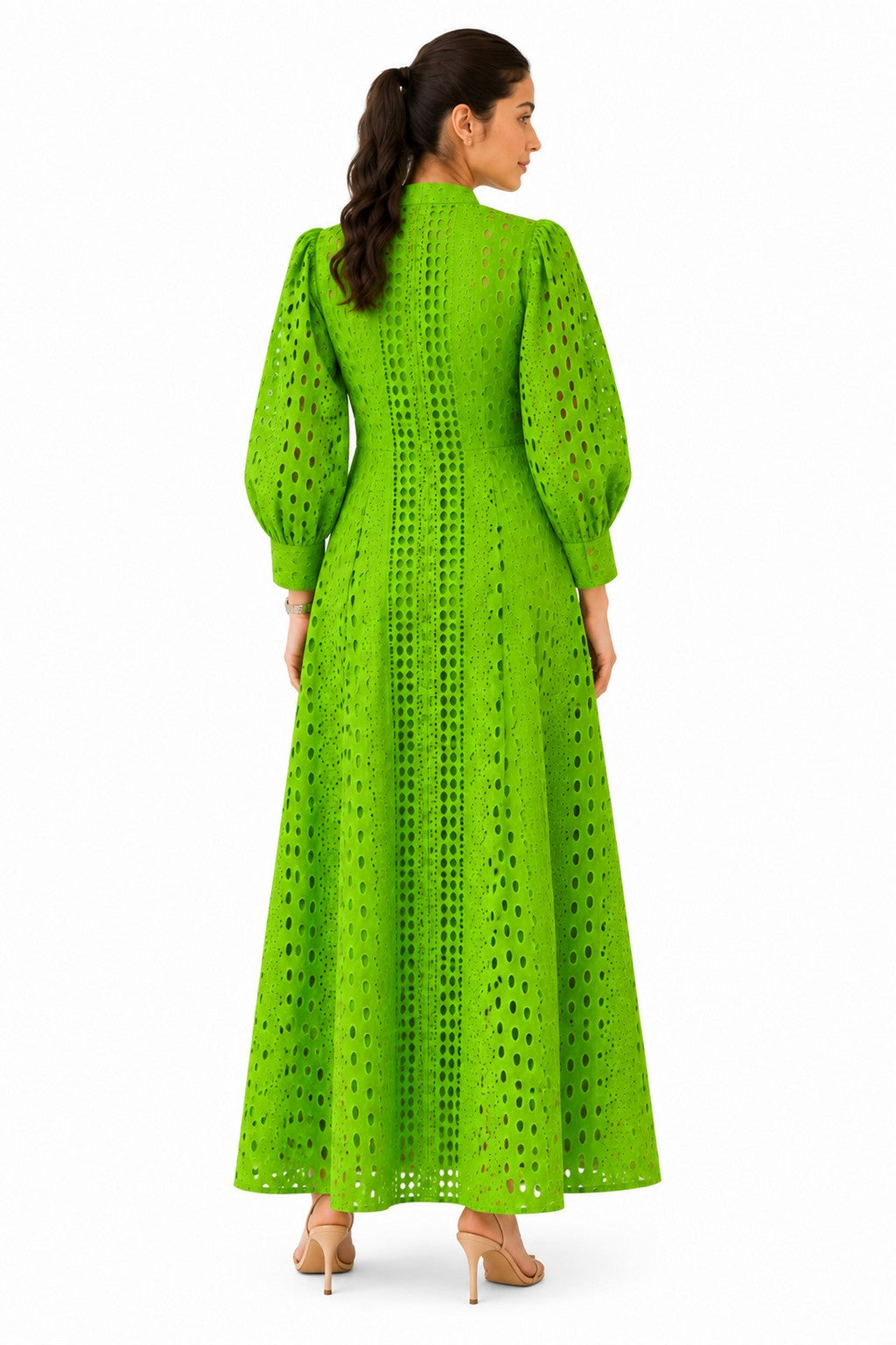 Clean, flowing back with full-length cutwork detailing and a graceful flared hem.