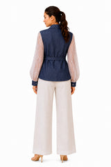 Clean navy back with a fitted wrap construction, elegant waist definition, and sheer lace sleeves for contrast.