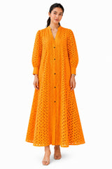 Vibrant orange shirt dress featuring a mandarin collar, button-down front, voluminous sleeves, and intricate all-over cutwork detailing.