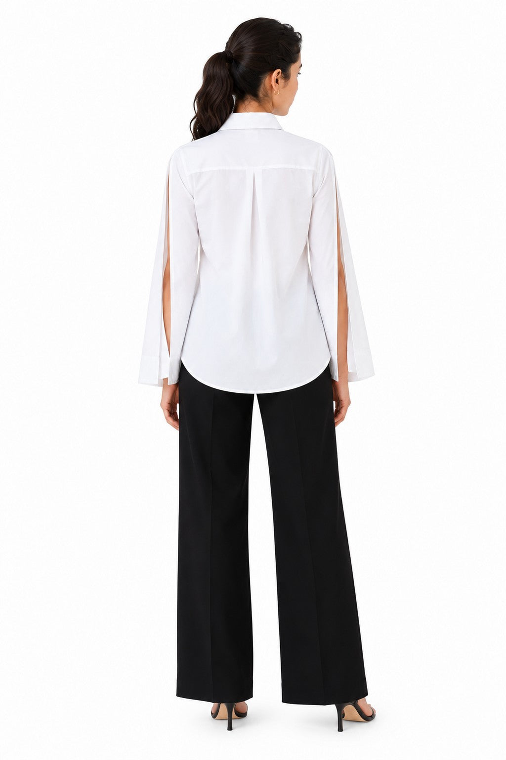 Clean white back with a softly relaxed fit, flowing open sleeves, and a minimal finish.