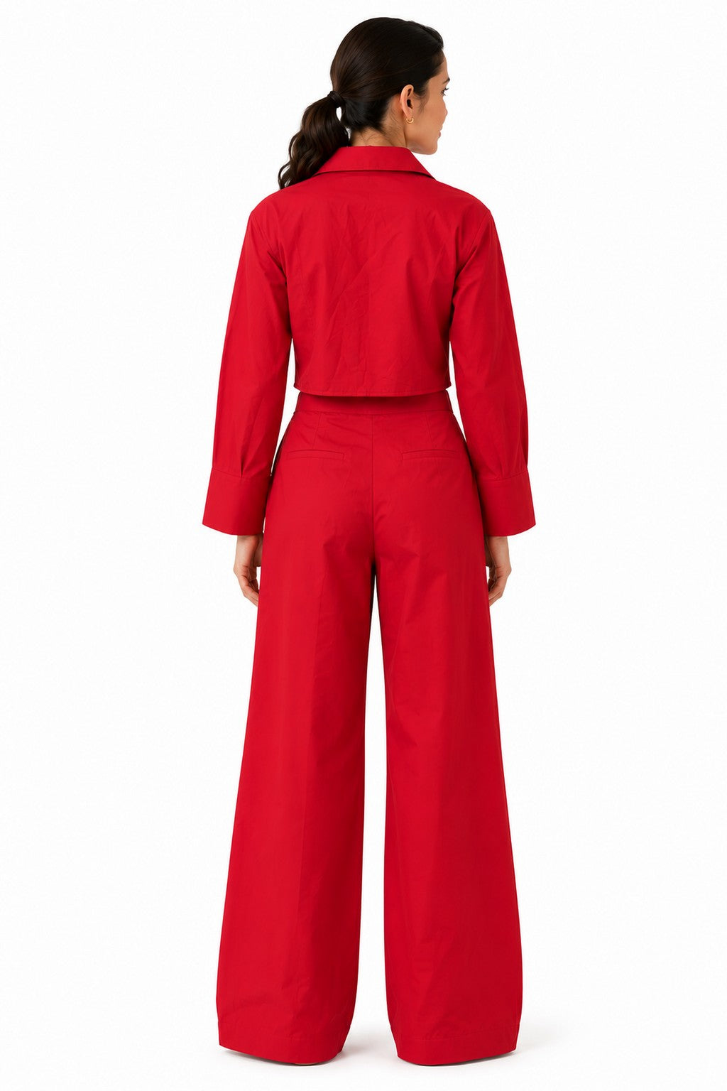 Clean cropped-back shirt design with a relaxed fit, complemented by the flowing wide-leg trousers for a polished finish.