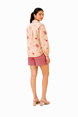 Terra Coord warm neutral shirt and shorts set with red motifs
